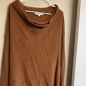 Left sweater, size medium.